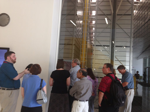 Tour group listening to tour guide at the Hunt Library